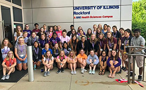 Rural Health Careers Camp participants assembled at the entrance to U of I Rockford.