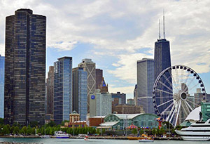 Chicago skyline and ferris wheel, as seen from the lake.