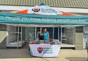 Manning the Wabash General Hospital tent - People you know, helping people you love.
