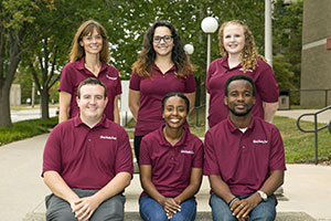West Central's first rural health coach class poses in their maroon polo shirts.