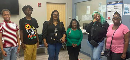 CHW Pathway participants and Ronisha Edwards-Elliot at Family Christian Health Center.