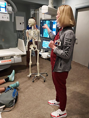 A visit to the radiology lab features a model of a human skeleton.