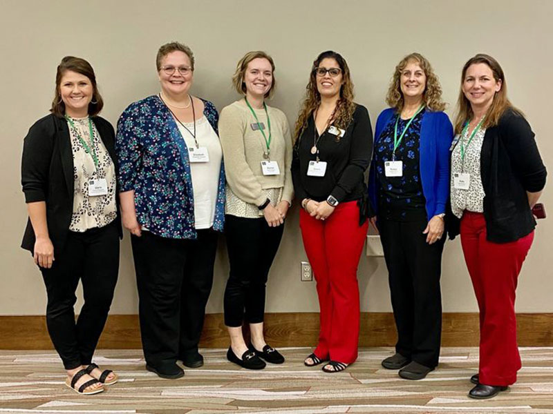 Group photo of Illinois AHEC attendees at the 2023 Illinois Rural Health Association annual conference.