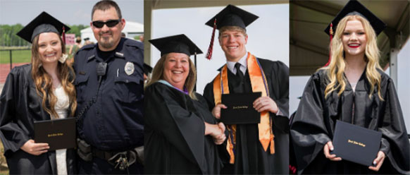 Students in graduation gowns and mortarboards, holding their Rend Lake College diplomas.